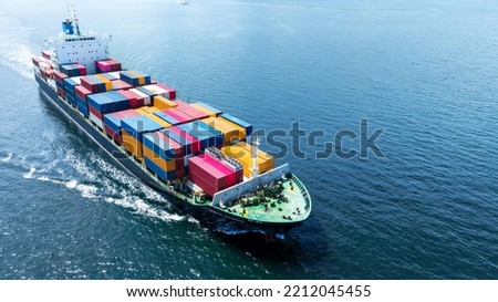 Aerial front of cargo ship carrying container and running 
near international custom depot sea port concept smart logistic service.  forwarder mast