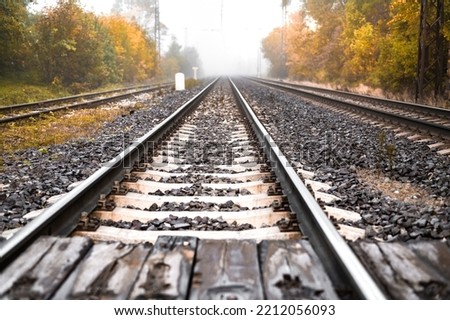 Railway tracks in country on the autumn. Train journey. 