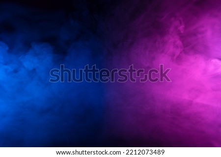 Colorful smoke clouds in blue and pink neon light swirling on empty scene background with reflection Royalty-Free Stock Photo #2212073489