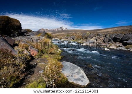 mount ruapehu New Zealand's largest volcano on the north island at the edge of a river Royalty-Free Stock Photo #2212114301