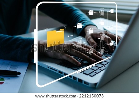 document management system. business hand using laptop computer with virtual graphic icon on desk at home, digital marketing, cloud computing, business finance, internet network technology concept