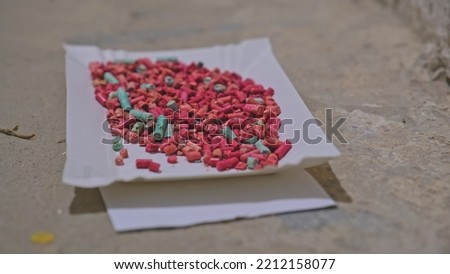 Rat Poison Pellets Granules for Killing Rodent Pest Mouse Left on Basement Floor Parallax Royalty-Free Stock Photo #2212158077