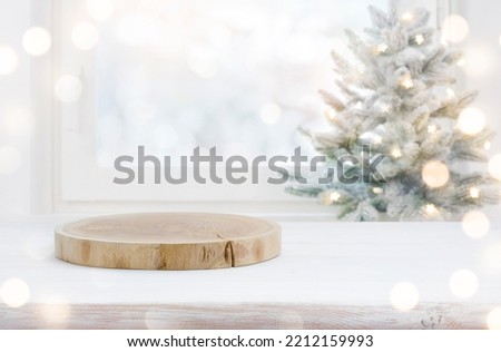 Festive Christmas background with table and podium for product display