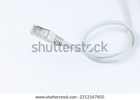network cable rj 45, isolated on white background Royalty-Free Stock Photo #2212167605