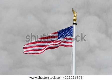 Stars and Stripes in color with black and white sky