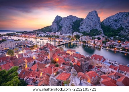 Omis, Croatia. Cityscape image of beautiful coastal town Omis, Dalmatia, Croatia at summer sunset. Royalty-Free Stock Photo #2212185721