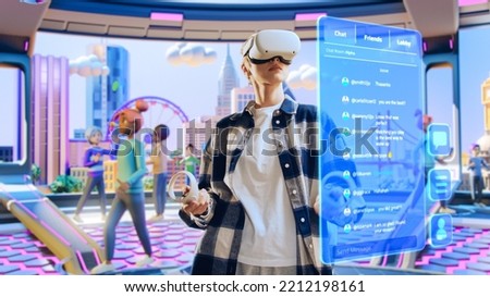Young Creative Female Wearing a Virtual Reality Headset at Home. Woman Enters Digital Internet 3D Universe with Avatars. Next Generation Immersive Social Media Online Metaverse Platform. Royalty-Free Stock Photo #2212198161