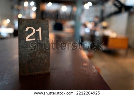 Table number at a cafe Royalty-Free Stock Photo #2212204925