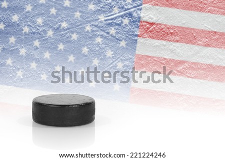 Hockey puck and the image of the American flag. 
