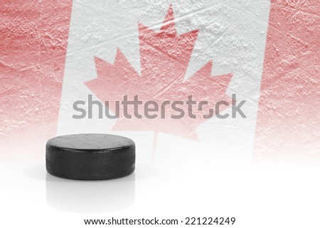 Hockey puck and a Canadian flag image
