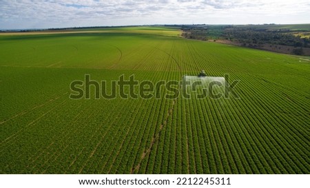Agricultural sprayer working in bean field, Brazil Royalty-Free Stock Photo #2212245311