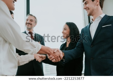Large professional business person team meeting to showing group unity with their hands together, corporate friends teamwork support working to power and company success concept