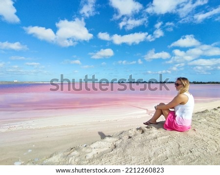 Woman in The Coloradas, Las Coloradas, The Pink lagoon, salt lakes, saline water, Rio Lagartos Municipality, Yucatán, Mexico Royalty-Free Stock Photo #2212260823