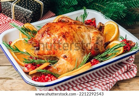 Festive celebration roasted chicken with Pomegranate and Orange