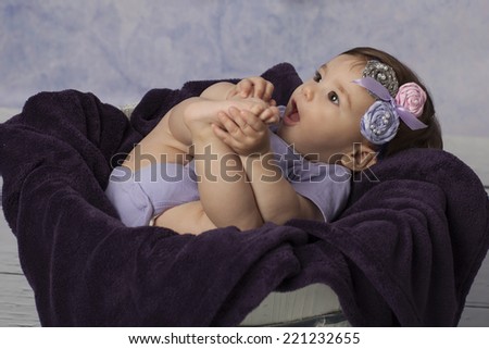 Closeup of Smiling Baby Girl in basket