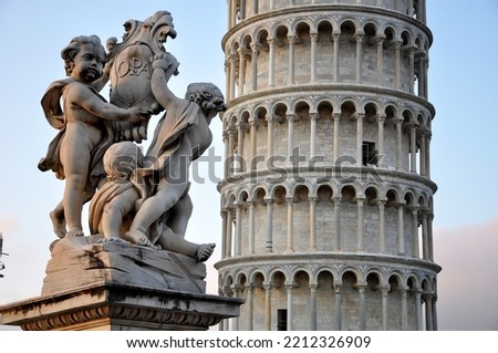pisa tower with some sculptures Royalty-Free Stock Photo #2212326909