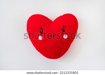 Soft toy red heart  with smile