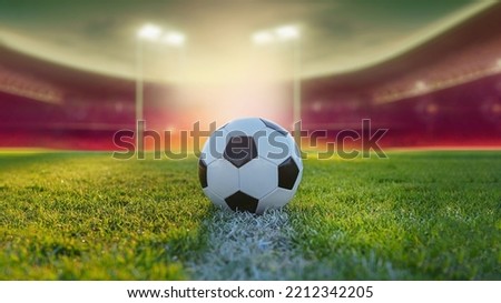 ball on the green field in soccer stadium. ready for game in the midfield Royalty-Free Stock Photo #2212342205