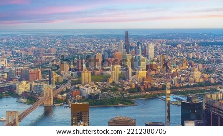 Cityscape of downtown Brooklyn skyline  from Manhattan New York City at sunset  