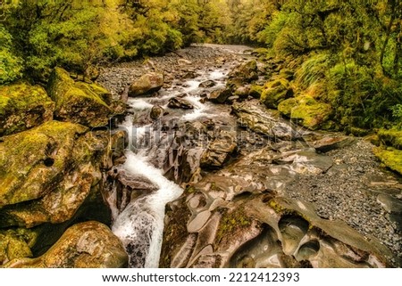 Two bridges over the Cleddau River offer dramatic views of a series of powerful waterfalls.

Thousands of years of swirling water have sculpted shapes and basins in the rock. . Royalty-Free Stock Photo #2212412393