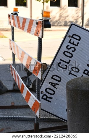 road closed sign on side

