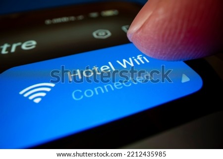 Close-up view of connecting smartphone to hotel wifi, shot with macro probe lens