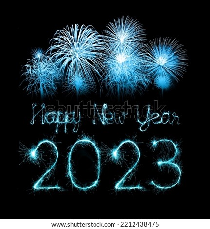 2023 happy new year fireworks celebration written sparkling at night	