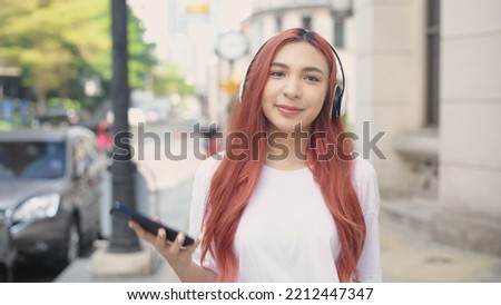 Holiday concept of 4k Resolution. Asian woman walking in the city. teenage girl fashion.
