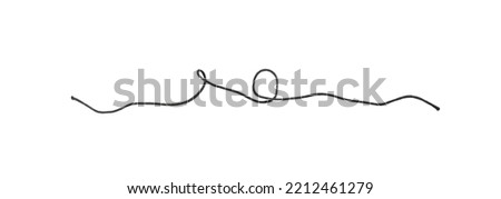 Black string piece isolated. Dark shoelace fragment, part of packaging lace, black cord knots on white background Royalty-Free Stock Photo #2212461279