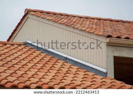 Step and Cover Flashing roof house flashing strip with lead skirt flap for waterproofing Royalty-Free Stock Photo #2212463413