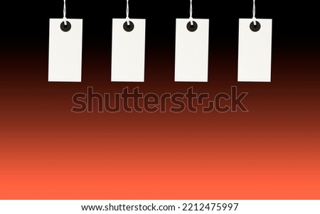 four white empty tags on a black background with a gradient