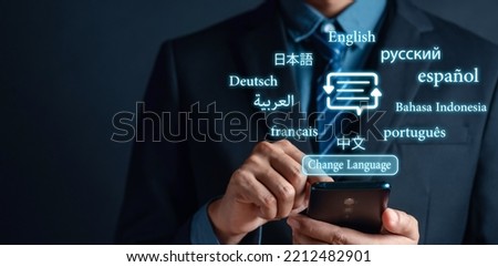 Businessman using smartphone for translation or translate on the mobile app worldwide language conversation speaking concept.