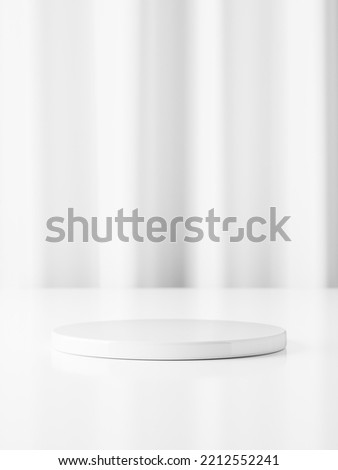 3d white ceramic display podium on table against white curtain background. 3d rendering of realistic presentation for product advertising. 3d illustration.