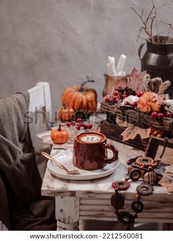A cup of coffee in autumn vibes concept. Selective focus