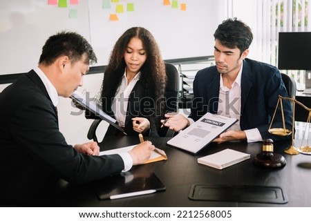 Business and Male lawyer or judge consult having team meeting with client, Law and Legal services concept.Customer service good cooperation in office

