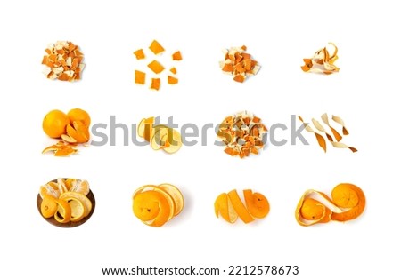 Heap of Dry Sliced Orange Peel Isolated on White Background. Chopped Zest Photographed with Natural Light Top View Royalty-Free Stock Photo #2212578673