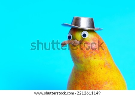 Close-up of a plump kiwi-bird like pear character with googly eyes wearing a cowboy hat pretending to be a detective.
