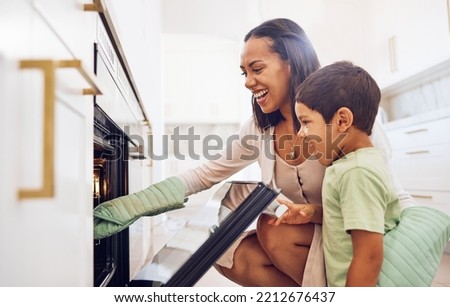 Mother, child and baking in oven learning to make biscuits, cookies or cake in home kitchen. Care, support or love of happy parent bonding, cooking or teaching boy to bake dessert on stove together Royalty-Free Stock Photo #2212676437