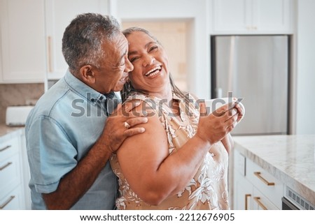 Love, laughing and elderly couple embrace in kitchen, having fun, talking and being silly together. Happy family, relax and retirement by senior man and woman enjoy conversation and relaxed lifestyle Royalty-Free Stock Photo #2212676905