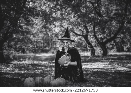 Halloween time, witch Lady in Mystical forest, October atmosphere, witchcraft concept, ideas for mysterious Party 