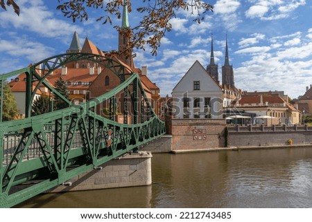 Wrocław, the Tumski Bridge, the old part of the city in the background. Autumn