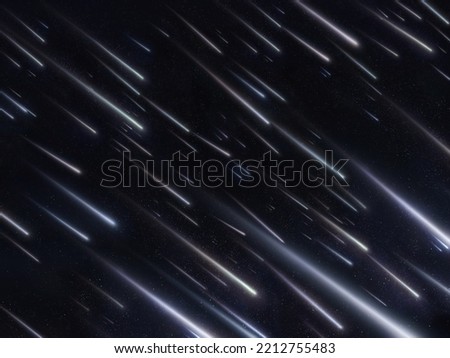 Beautiful meteor shower in the sky. The glow of thousands of falling meteorites in the atmosphere. Star rain, falling stars.