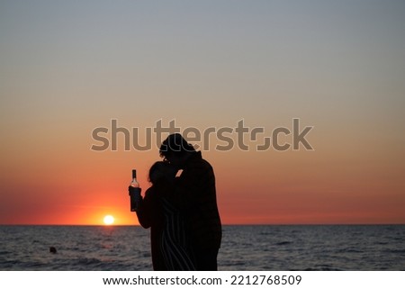 love at sunset. Silhouette couple in love kissing