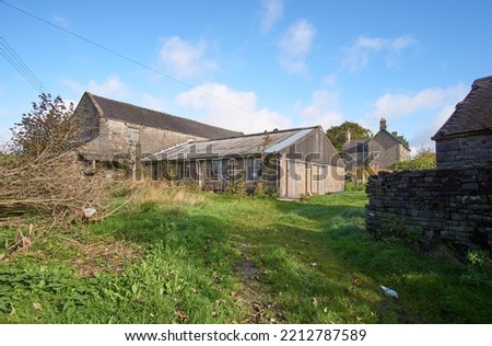 Abandoned derelict farm buildings example Royalty-Free Stock Photo #2212787589