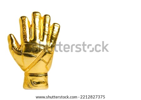 A picture of miniature golden gloves on white background. Award for Best Goalkeeper. Royalty-Free Stock Photo #2212827375