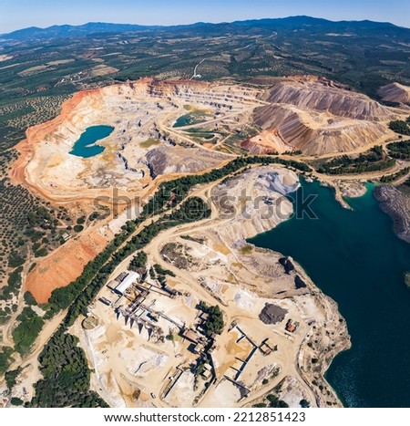 Square drone aerial shot of an open-mine in Greece. Impact on nature concept. High quality photo