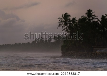 Land coastal land view dusk twilight - Slow shutter photo in a village beach in the evening with cloudy sky and sea rocks , wide beautiful Color Collector - Sri Lanka