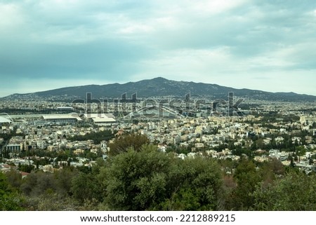 View from a hill to the north side of Athens city-Greece.Cloudy sky at the background.