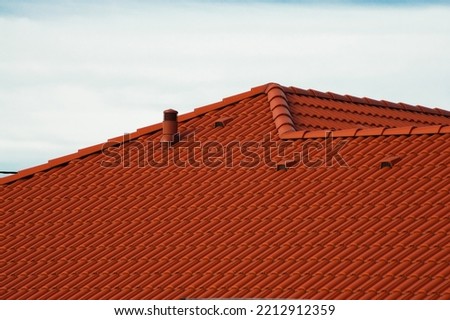 New roof, in sandwich panel similar to the tile, more beautiful and insulated. Royalty-Free Stock Photo #2212912359