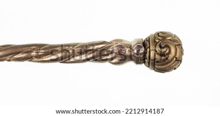 golden scepter isolated on white background Royalty-Free Stock Photo #2212914187